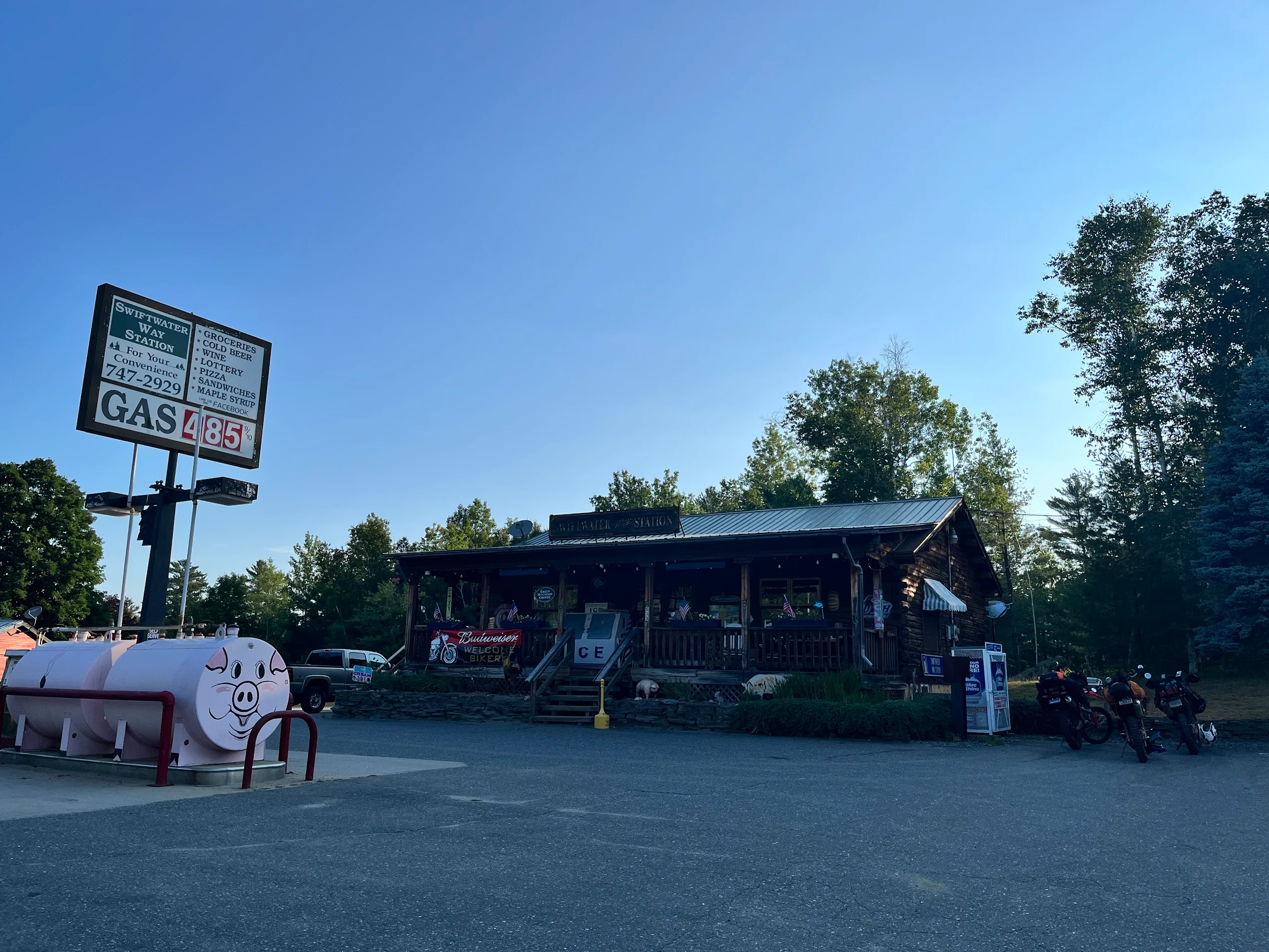 Swiftwater Way Station with pig gas pumps and motorcycles